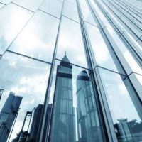 landmarks reflection on glass walls of skyscrapers